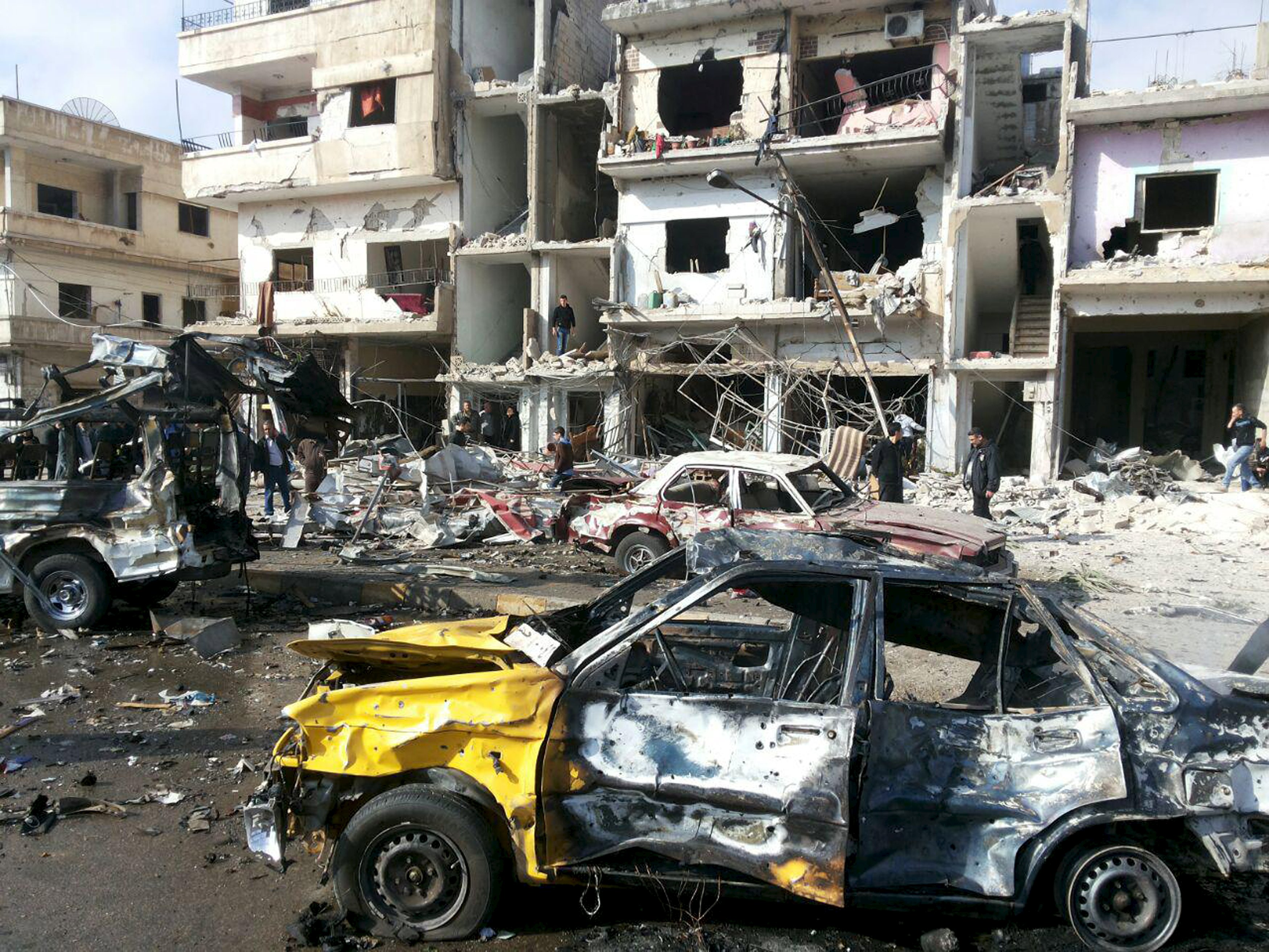 Duplo atentado neste domingo (21) na cidade de Homs, na Síria (Foto: REUTERS/SANA/Handout via Reuters)